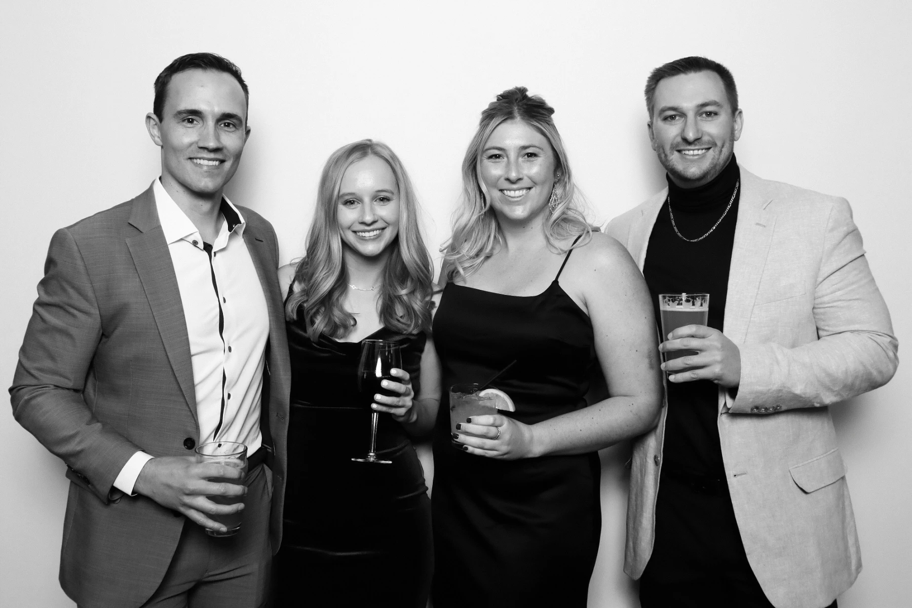 Signature glam filter before and after example for black and white Glam Booth portraits